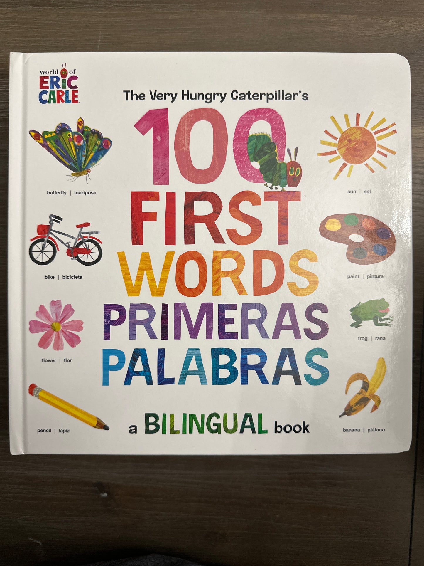 The Very Hungry Caterpillar’s 100 First Words Primeras Palabras, by Eric Carle